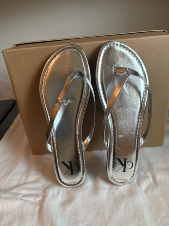 Calvin Klein Shoes - Calvin Kline silver flip flops